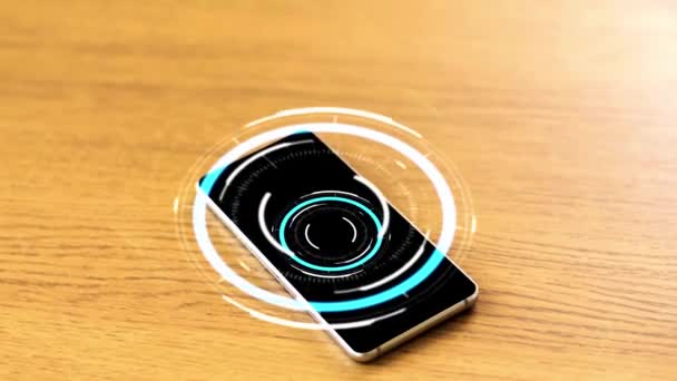 Smartphone with virtual circuit hologram on table — Stock Video