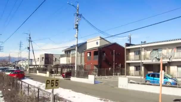 Met het oog op de voorstad van trein of spoorlijn in japan — Stockvideo