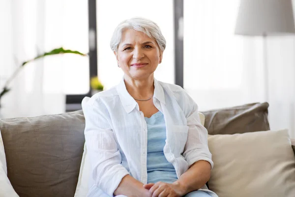 Portrait of happy senior woman laughing — Stok Foto