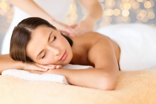 Close up of beautiful woman having massage at spa — Stock Photo, Image