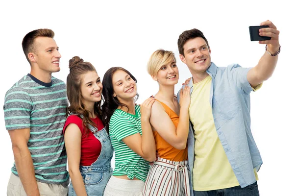 Friends taking selfie by smartphone — Stock Photo, Image