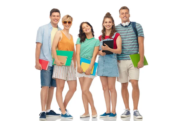 Studenti con quaderni, libri e cartelle — Foto Stock