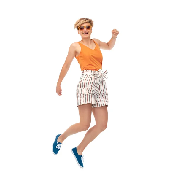 Szczęśliwy nastoletnie dziewczyny w okulary, skoki — Zdjęcie stockowe