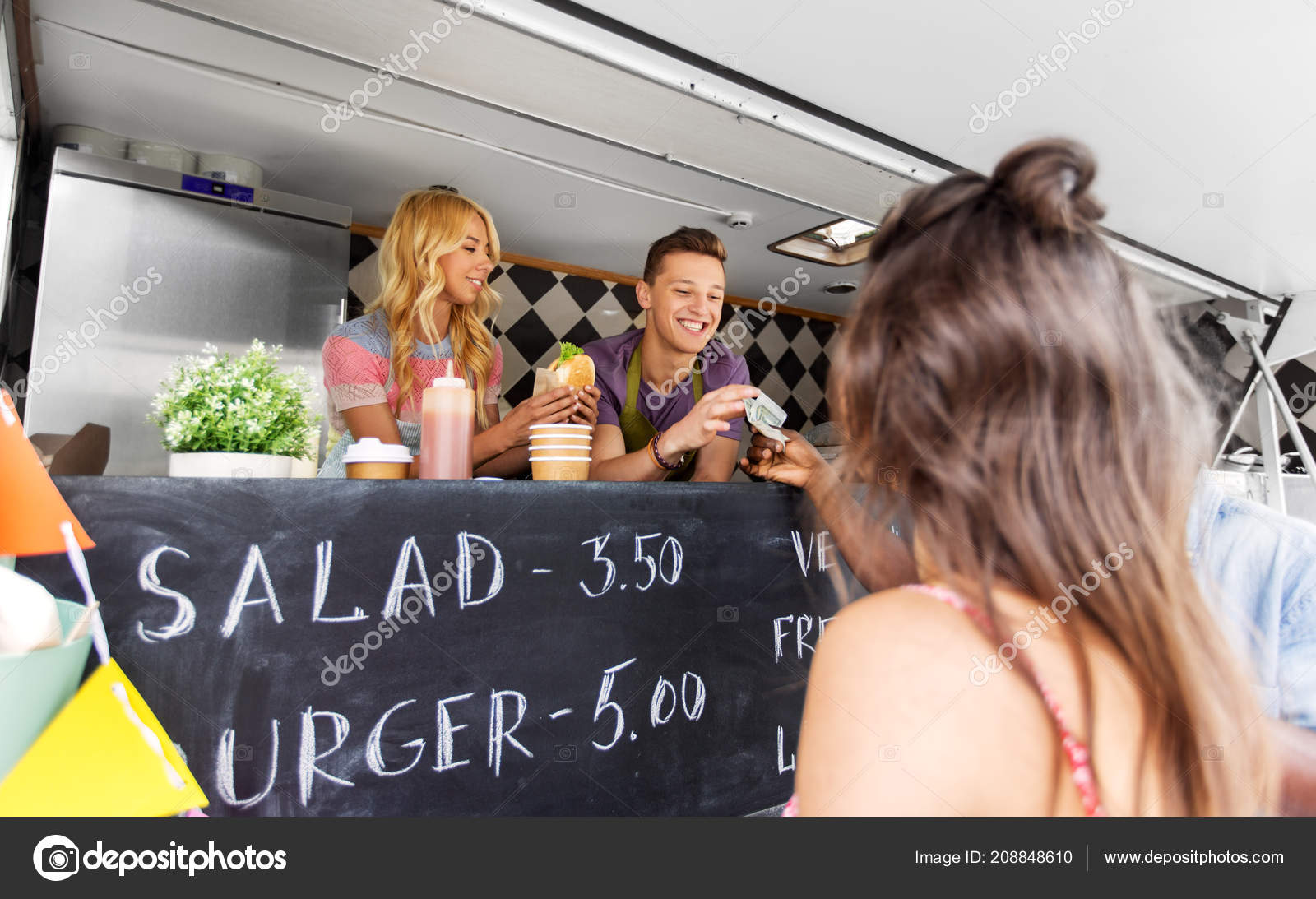 Happy Customers Buying Burger At Food Truck Stock Photo