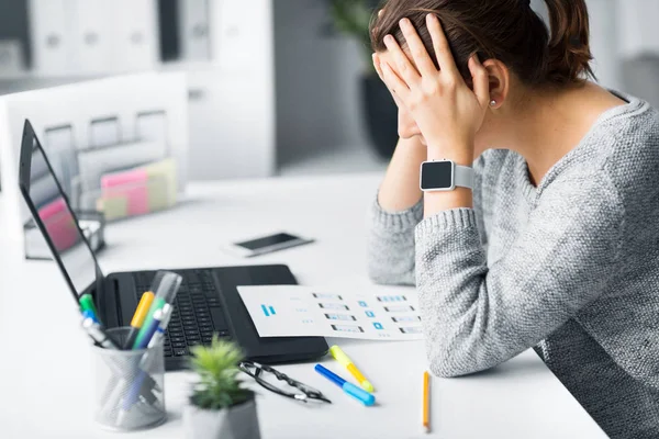 Stressed web designer with user interface layout — Stock Photo, Image