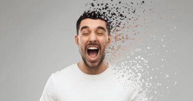crazy shouting man in t-shirt over gray background clipart
