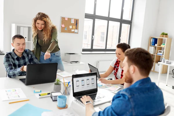 creative team working on user interface at office