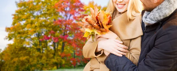 Close up of couple hugging in autumn park — Stock Photo, Image