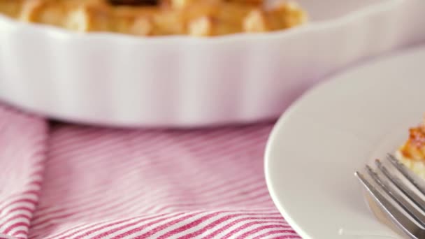 Close up of apple pie with ice cream on plate — Stock Video