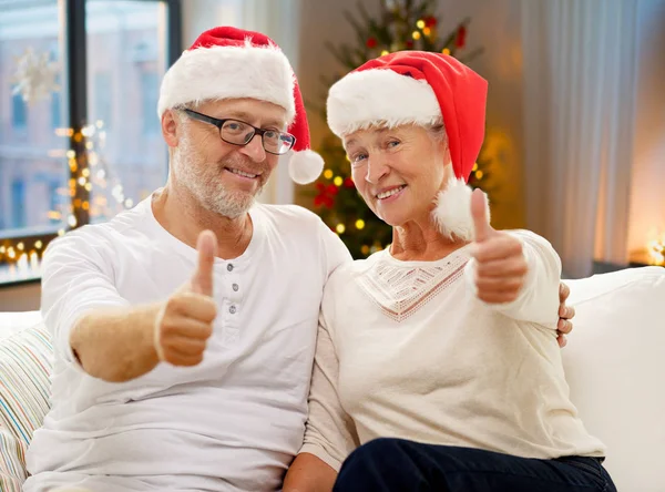 Happy senior couple at home on christmas — Stock Photo, Image