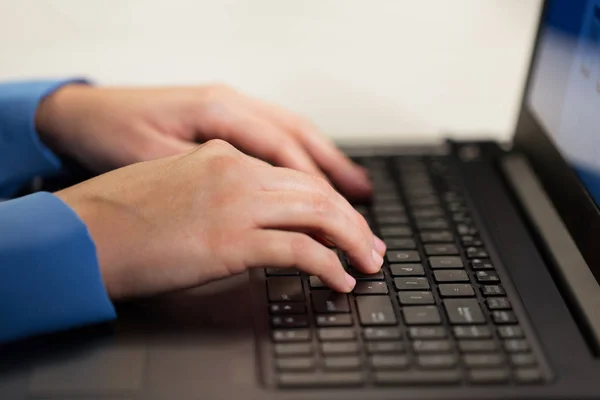 Close up of female hands with laptop typing — Stock Photo, Image