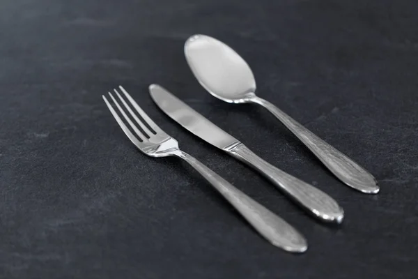 Close up of fork, knife and spoon on table — Stock Photo, Image