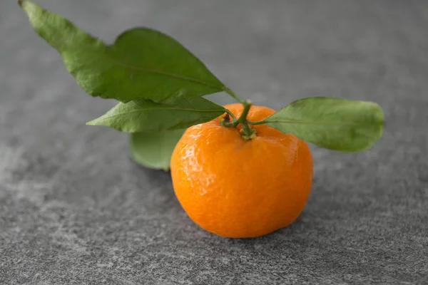 Close up of mandarin on table — Stock Photo, Image
