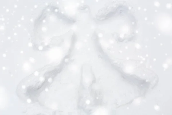 Angel silhouette or print on snow surface — Stock Photo, Image