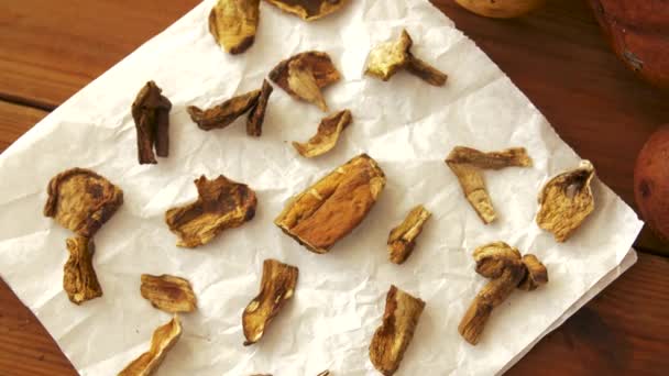 Dried mushrooms on baking paper — Stock Video