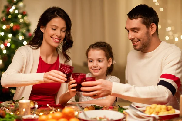 Happy family having christmas dinner at home — Stock Photo, Image