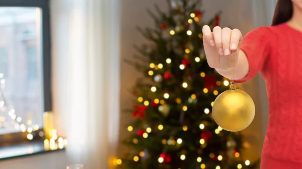 Close up of woman holding christmas ball — Stock Photo, Image