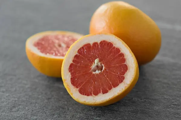 Close up of fresh juicy grapefruits — Stock Photo, Image