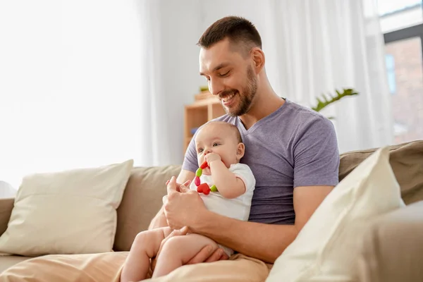 Happy father with little baby daughter at home — Stock Photo, Image