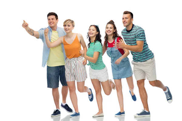 Friends running to something over white background — Stock Photo, Image