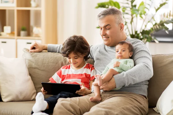 Happy father with preteen and baby son at home — Stock Photo, Image