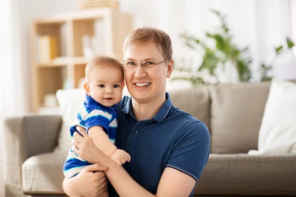 Happy baby boy with father at home — Stock Photo, Image