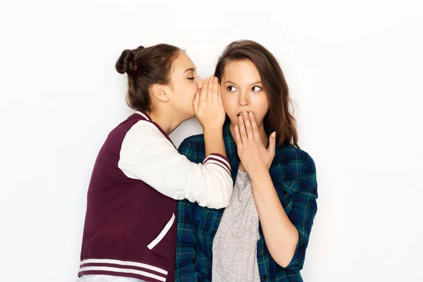 Teenage girls gossiping or sharing secrets — Stock Photo, Image