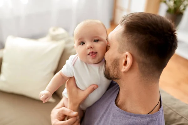 Close up of father with little baby girl at home — Stock Photo, Image