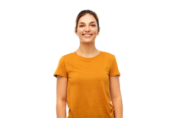 Young woman or teenage girl in orange t-shirt — Stock Photo, Image