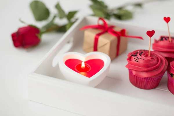 Close up of candle and cupcakes for valentines day — Stock Photo, Image
