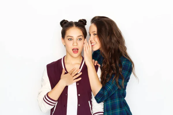 Teenage girls gossiping or sharing secrets — Stock Photo, Image