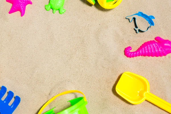 Close up of sand toys kit on summer beach — Stock Photo, Image