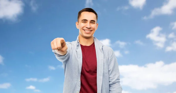 Man pointing finger to you over blue sky — Stock Photo, Image