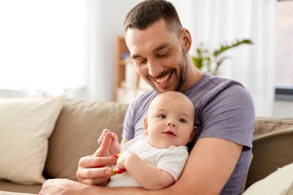 Happy father with little baby daughter at home — Stock Photo, Image