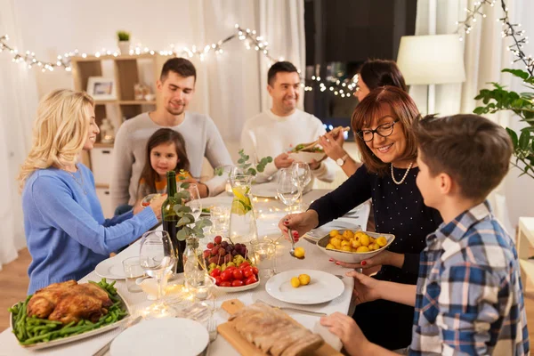 Happy family having dinner party at home — Stock Photo, Image