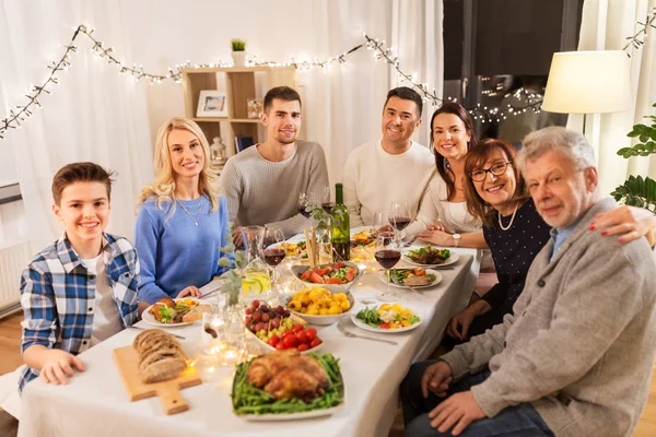 Happy family having dinner party at home — Stock Photo, Image