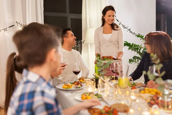 Happy family having dinner party at home — Stock Photo, Image