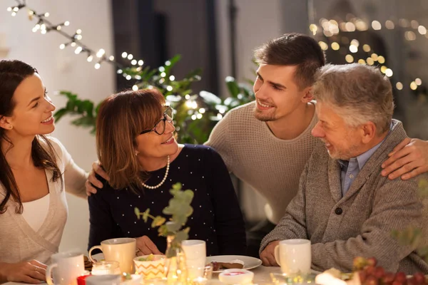 Happy family having tea party at home — Stock Photo, Image