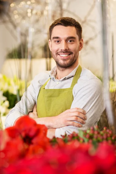 Florist Mann oder Verkäufer am Blumenladen Theke — Stockfoto