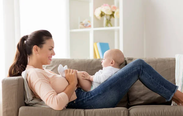 Happy mother with little baby boy at home — Stock Photo, Image