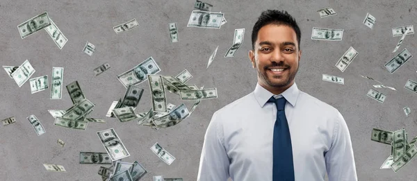 Indian businessman over money rain — Stock Photo, Image