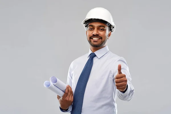 Architect or businessman in helmet shows thumbs up — Stock Photo, Image