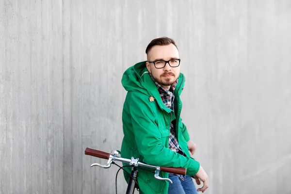 Happy young hipster man with fixed gear bike — Stock Photo, Image