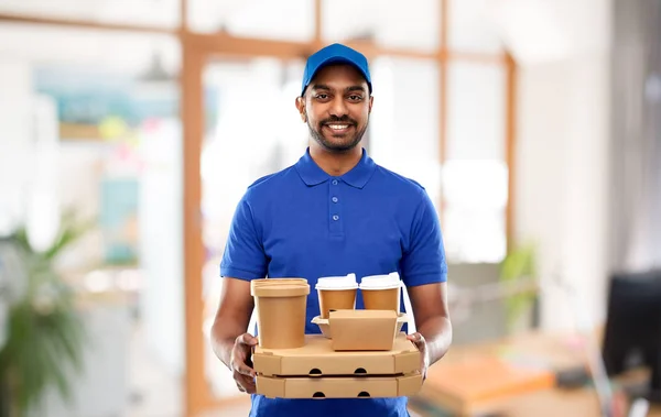 Indian delivery man with food and drinks at office — Stock Photo, Image