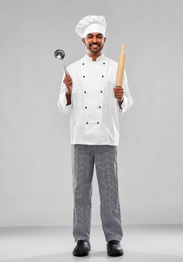 happy indian chef with ladle and rolling-pin clipart