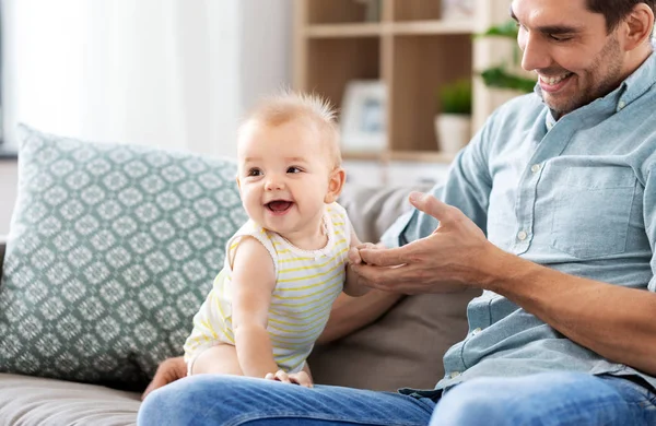 Father with little baby daughter at home — Stock Photo, Image