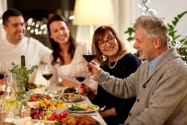 Happy family having dinner party at home — Stock Photo, Image