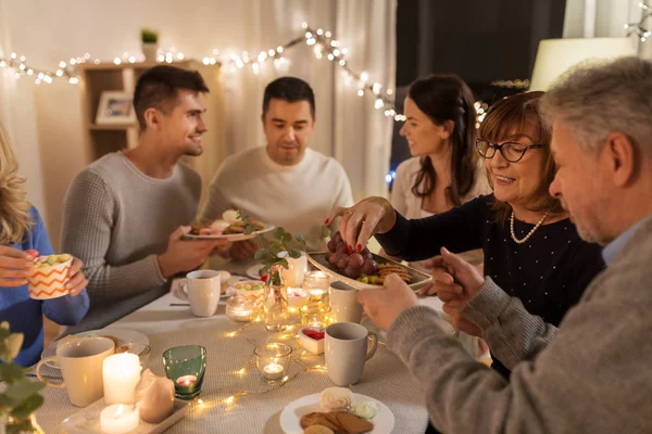 Happy family having tea party at home — Stock Photo, Image