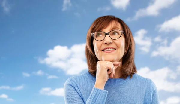 Portret van senior vrouw in glazen dromen — Stockfoto