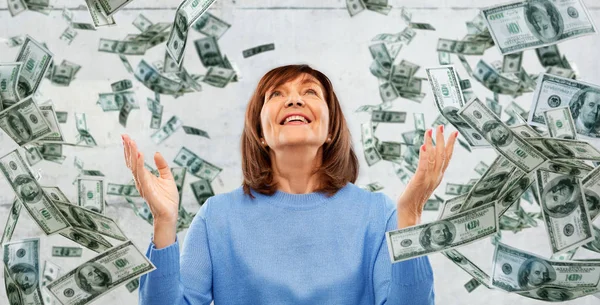 Grateful senior woman and money falling from above — Stock Photo, Image